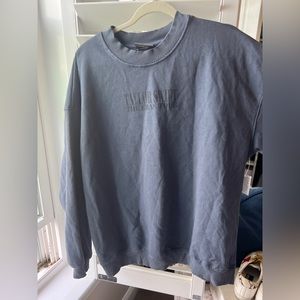 Taylor Swift blue crewneck i have 2 larges and 3 mediums. CANNOT BE FOUND ONLINE